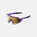 Gafas de ciclismo Velo Store Mx Koo Spectro Luce con montura morada y lente de espejo dorada Zeiss