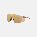 Lentes deportivos KOO Nova de Velo Store Mx con lente Zeiss dorada espejada y patillas naranjas, diseño ultraligero.