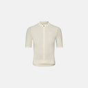 Maillot de ciclismo Velo Store Mx Pas Normal Studios Essential Light en color blanco hueso con mangas texturizadas.