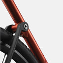 Detalle del punto de pivote del cuadro de la bicicleta Velo Store Mx Basso Tera Gravel en color siena con acabado premium