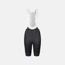 Bib shorts para dama Pas Normal Studios Mechanism en color negro con tirantes de malla blancos, diseño aerodinámico.