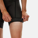 Bib shorts Velo Store Mx Mechanism de ciclismo para mujer en color negro con textura técnica y ajuste de compresión