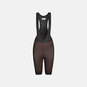 Bibs de ciclismo para mujer Velo Store Mx Essential en color marrón con tirantes de malla negra y diseño ergonómico.