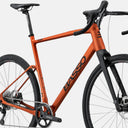 Bicicleta de gravel Velo Store Mx Basso Tera Siena con cuadro naranja, horquilla de carbono y grupo Shimano GRX 1x12.