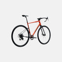 Bicicleta de gravel Velo Store Mx Basso Tera Siena con cuadro naranja, transmisión Shimano GRX 1x12 y ruedas Microtech