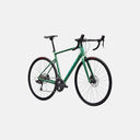 Bicicleta de ruta Specialized Allez Comp en color verde con cuadro de aluminio, horquilla de carbono y frenos de disco.