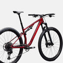 Bicicleta de montaña Specialized Chisel Base en color rojo, con doble suspensión, transmisión SRAM NX Eagle y cuadro de aluminio.