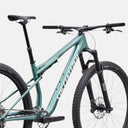 Bicicleta de montaña Specialized Epic 9 Sport de carbono en color verde azulado con suspensión doble y componentes SRAM