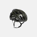 Casco de ciclismo Velo Store Mx Kask Mojito 3 con diseño de camuflaje en tonos verde oliva y negro para ruta y gravel.