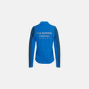 Vista trasera de la chaqueta térmica de ciclismo Velo Store Mx Pas Normal Studios Essential para mujer en color azul