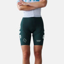 Ciclista con culotte corto verde oscuro Pas Normal Studios Mechanism Pro de alto rendimiento y ajuste aerodinámico