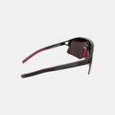 Gafas de ciclismo Velo Store Mx KOO HYPE Strade Bianche con montura negra, patillas rojas y lente de espejo Siena Red.