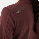 Jersey de ciclismo Velo Store Mx Velocio Delta Trail color burdeos con tejido Polartec Delta y logo en el hombro