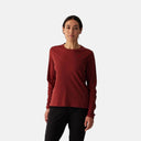 Mujer vistiendo jersey de ciclismo manga larga Velocio Delta TRAIL color terracota en Velo Store Mx