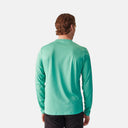 Vista trasera del jersey de ciclismo Velo Store Mx Ultralight de manga larga en color verde menta, tejido transpirable.