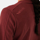 Jersey de ciclismo para dama Velo Store Mx Velocio Delta Trail en color vino con textura de rejilla y logo visible