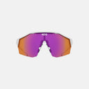 Lentes deportivos Koo Alibi de Velo Store Mx con montura blanca y lentes fotocromáticos de tono rojizo y violeta.