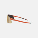 Lentes deportivos KOO Nova de Velo Store Mx en color naranja con lente Zeiss espejada y diseño aerodinámico.