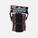 Llanta Velo Store Mx Pirelli Scorpion Enduro S 29x2.6 con flancos beige Classic y tacos agresivos para terreno suave.