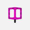Pedales de MTB Deity Deftrap en color rosa brillante, fabricados en compuesto de nailon con pines de acero de Velo Store Mx