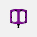 Pedales de MTB Velo Store Mx Deity Deftrap en color morado, fabricados en compuesto de nailon con diseño cóncavo.