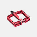 Pedales de MTB Velo Store Mx Deity TMAC rojos de aluminio mecanizado con diseño cóncavo y pines de alta tracción