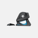 Rodillo de entrenamiento inteligente Velo Store Mx Tacx NEO 2T Smart en color negro y azul con soporte para rueda